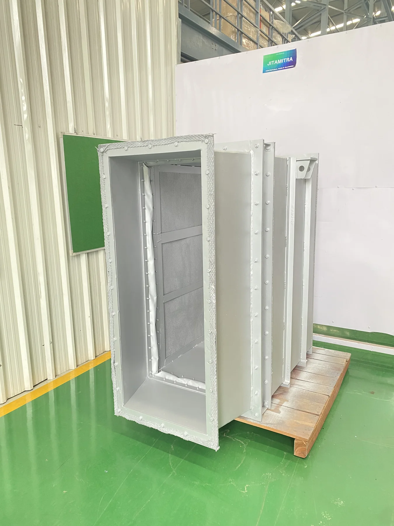 Fabricated plenum housing on its pallet in the assembly bay